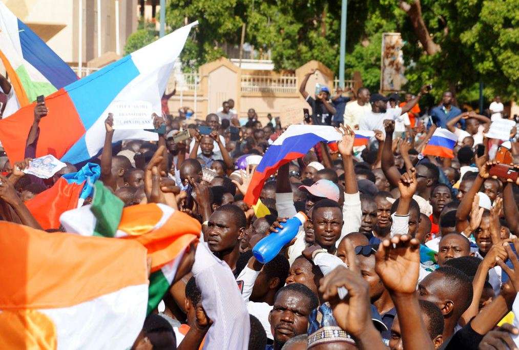 Civilian Coup Backers in Niger March On The Streets Of Niamey Waving Russian Flags 