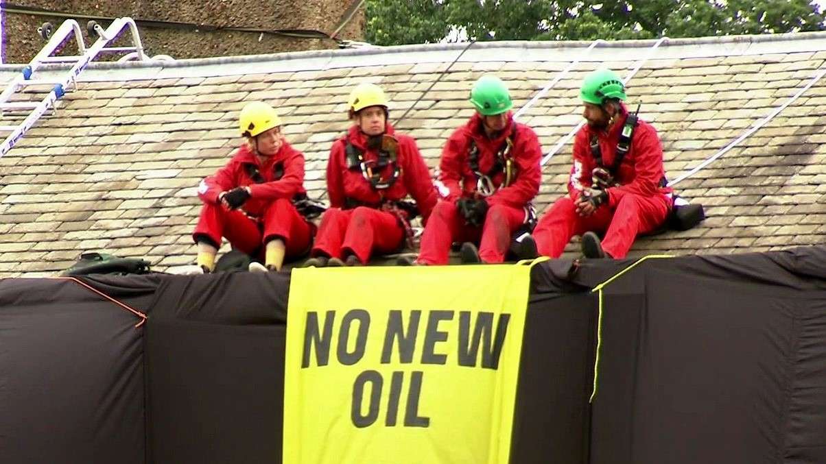 Shock As Greenpeace Activists Carry Out Protest On The Roof Of British PM’s House